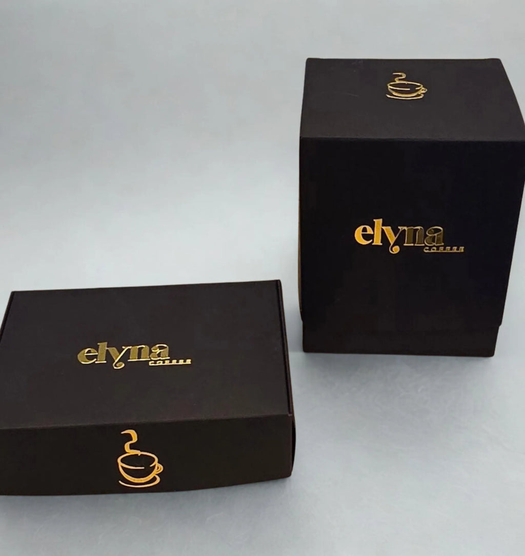 Two black boxes with 'elyna' branding on a white background
