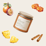 A jar of Elyna coffee GAYO MARGOGYPE specialty coffee, surrounded by watercolor illustrations of its scent ingredients including passion fruit, pineapple, and cinnamon, on a light beige background.
