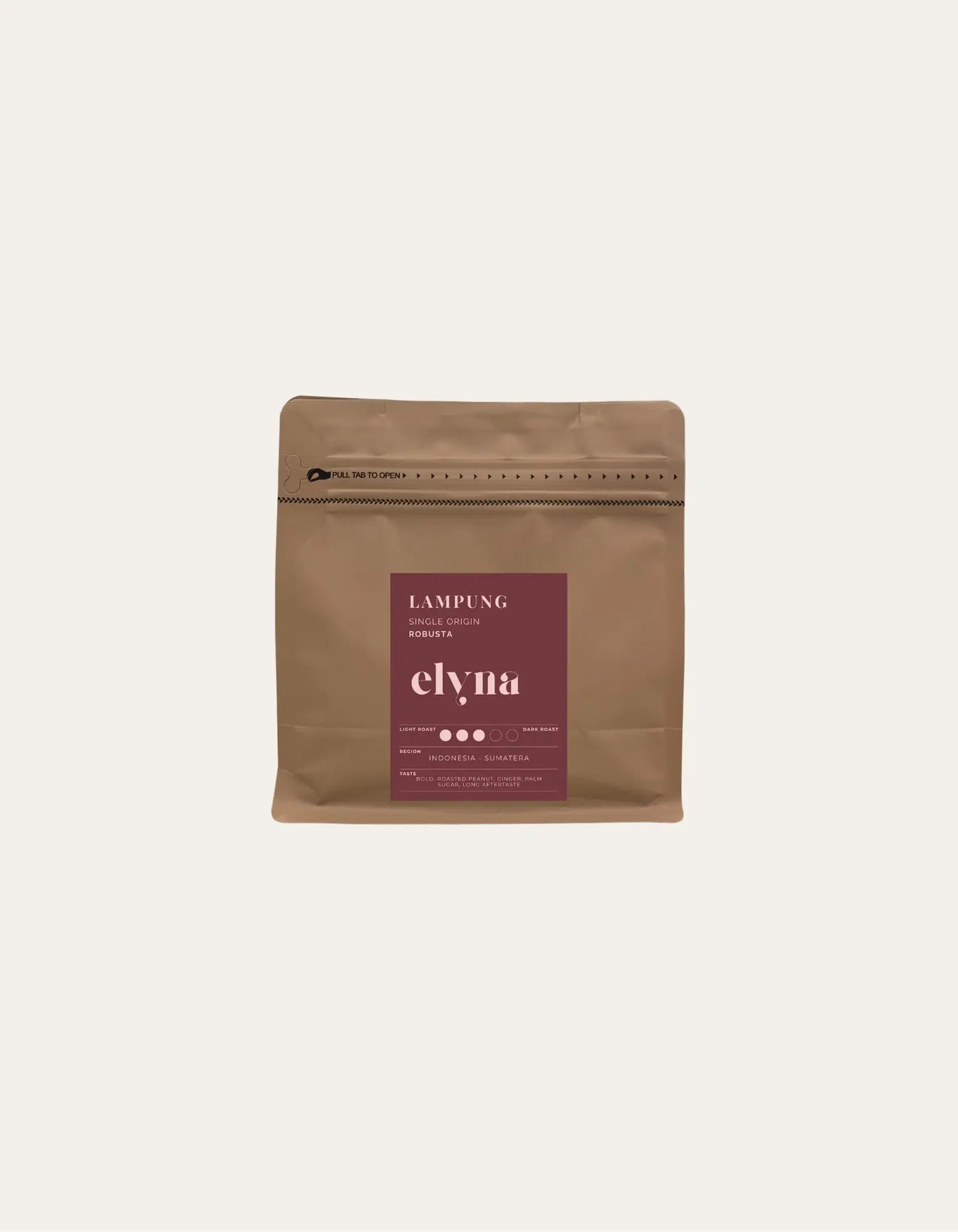 Brown coffee packaging with a red label on a beige background